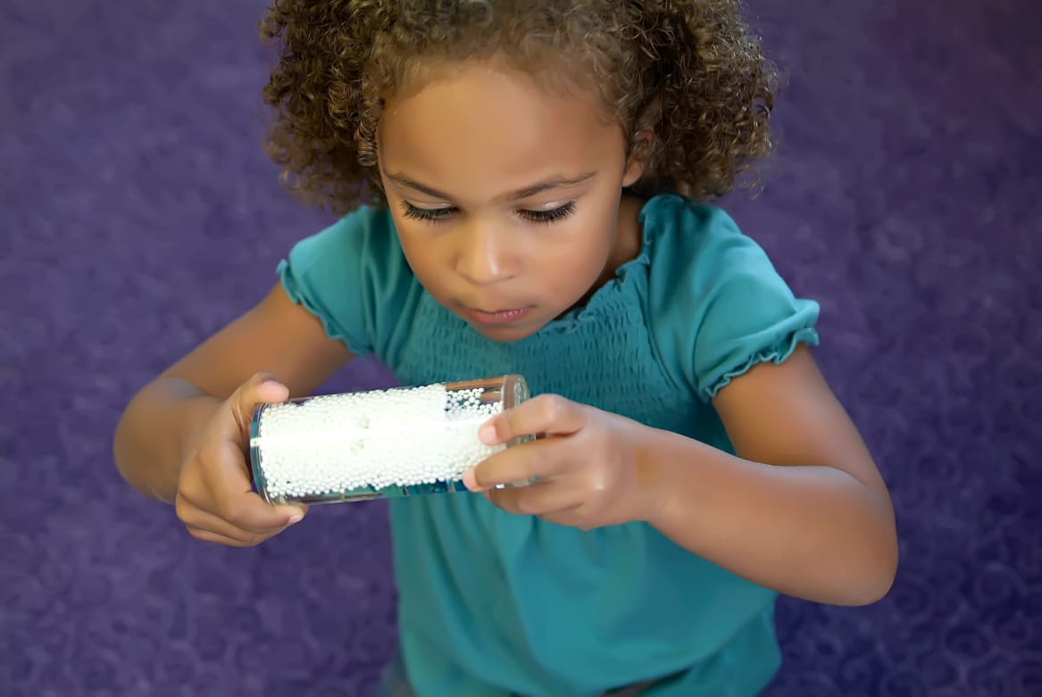Young child playing indoors